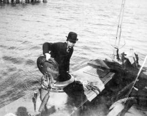 Fenian Ram designer John P. Holland exits the submarine after a test run